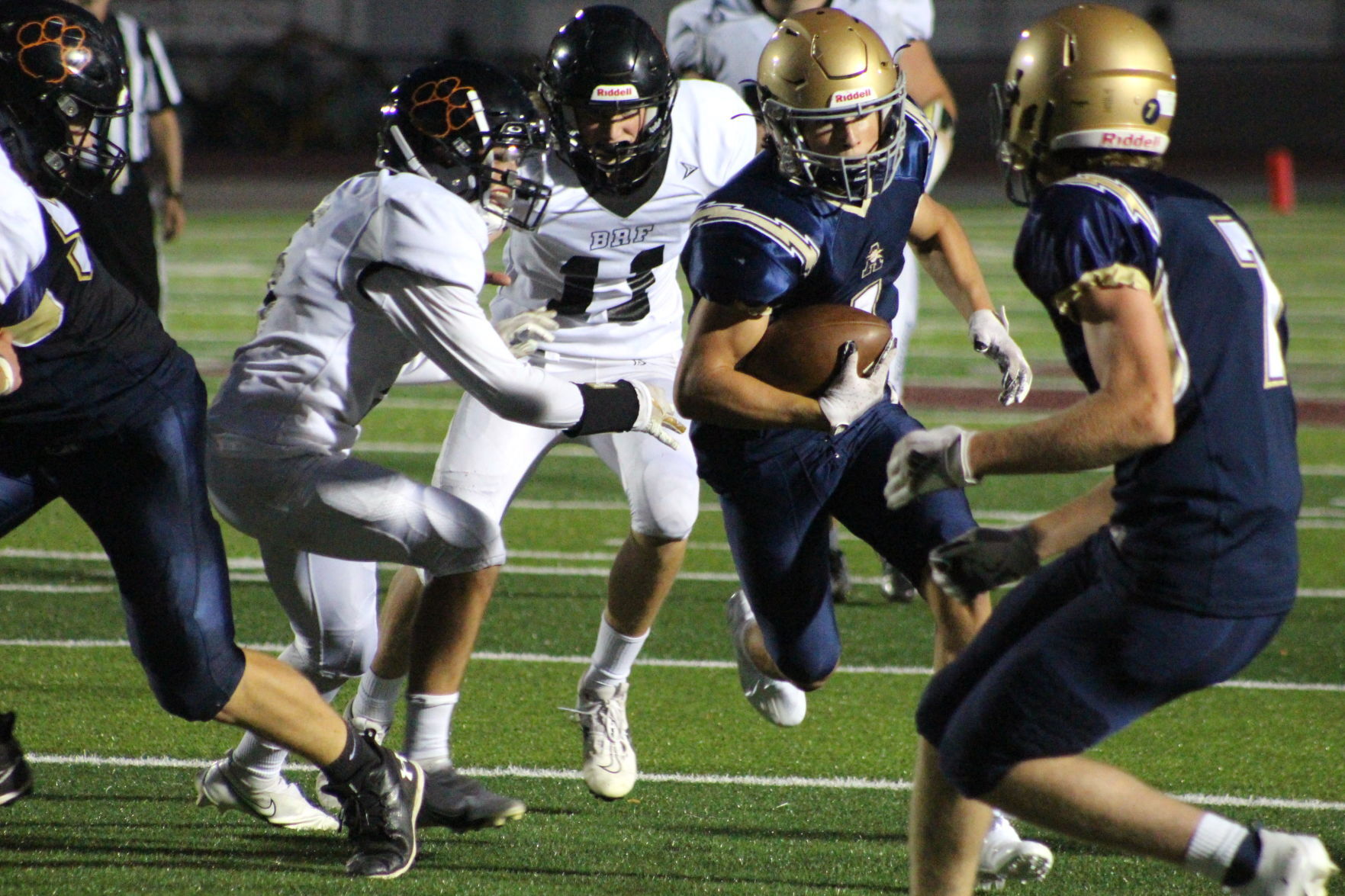 Jack Christenson carries the ball